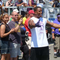 <p>Ray Rice meets fans and parents of his Ray Rice Day football campers in June, 2013 in New Rochelle.</p>