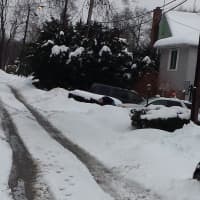 <p>Unplowed streets and snowed in cars in Yonkers.</p>