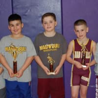 <p>Left to right are Nicky Singer, Jason Singer, Doug Cahill, Jacob Gonzales and Colin Fall. Damari Max also won a trophy for the Norwalk Mad Bulls.</p>