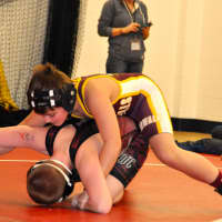 <p>Norwalk&#x27;s Patrick Coulter rides his opponent.</p>