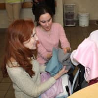 <p>Employees from Caren Forbes &amp; Co.? of New Canaan donated scarves to the residents of Waveny Care Center recently. </p>