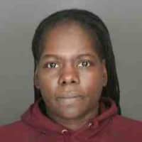 <p>Malaka Garrett was arrested and charged by Peekskill Police with possessing and selling heroin.</p>