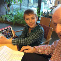 <p>Henry Benton,10, provided technology mentorship to Waveny LifeCare Network&#x27;s Harvey Chandler.</p>