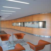 <p>This is the lobby at 3001 Stamford Square. The 144-foot-long back-lit, wood feature wall is visible from the street at night. </p>