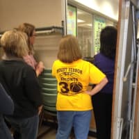 <p>Onlookers showed their support for the Mount Vernon basketball team.</p>