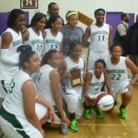<p>The Class B State Regional champion Woodlands Falcons with their trophies.</p>