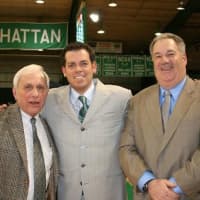 <p>Harvey grad and Manhattan College coach Steve Masiello (center) poses with his former prep school headmaster Barry Fenstermacher (left) and his former coach Tim Stark (right) when they were invited to a Manhattan game two years ago.</p>