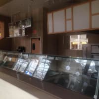 <p>The space formerly occupied by Sbarro is emptied out at the food court in the Danbury Fair Mall. </p>
