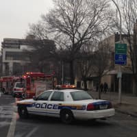 <p>Fire engines lined Martin Luther King Jr. Boulevard Wednesday in response to smoke coming from a store.</p>