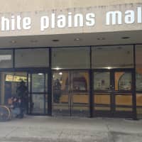 <p>White Plains firefighters used fans to remove smoke from the White Plains Mall after an electric motor began emitting smoke. </p>