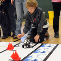 <p>Chris Calderwood, a Country School fifth-grader, engineered his robot to navigate an obstacle course autonomously. He and his partner, Jack Johnson, placed second in this event.</p>