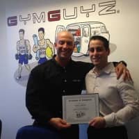 <p>GYMGUYZ CEO and Founder Josh York and his first franchuse owner Sam Langer of Irvington.</p>