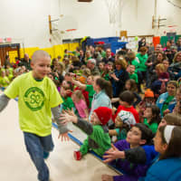 <p>A Stratfield School student receives congratulations after having his head shaved during the school&#x27;s annual St. Baldrick&#x27;s event.</p>