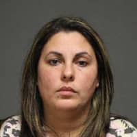 <p>Viviana Miranda, 34 of Bridgeport, herself in to Fairfield police on March 18 and was charged with larceny in the fifth degree and conspiracy to commit larceny in the fifth degree. She was released on a promise to appear in court on April 1. </p>