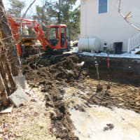 <p>Cleanup crews are onsite at a home on Upland Road in Yorktown.</p>