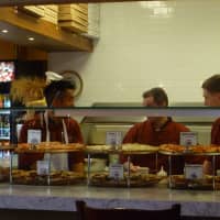 <p>The pizza counter at Amore in Armonk was hopping with discussion about the missing Malaysia Airlines flight.</p>