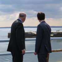 <p>Sen. Chuck Schumer and New Rochelle Mayor Noam Bramson looking at the damage to the seawall.</p>