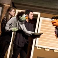 <p>Rachel Corbally, Joe Badion and Jack Baylis prepare for the Spring Main stage opening of &quot;AVENUE Q&quot; at Staples High School on Friday, March 21. </p>
