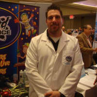 <p>Ron Sosinski of Mad Science said many people were curious about the experiments at his booth.</p>