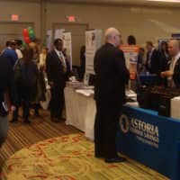 <p>Crowds of businesspeople mingle and network at the Westchester Business Expo at the Hilton Westchester in Rye Brook.</p>