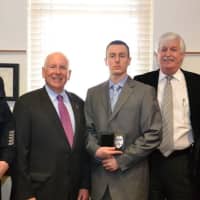 <p>Left to Right: Police Chief Dale Call, First Selectman Jim Marpe, Officer Brendon Fearon, Peter Fearon (Father), Marisa Fearon(Mother).</p>