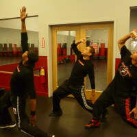 <p>From left, Brandon Durham, Chad Weiss and John Koga display Koga fitness.</p>