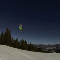 <p>Julia Marino grabs some big air during a practice snowboarding session in Colorado.</p>