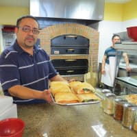 <p>Lauro Hernandez, the manager and chef at Lange&#x27;s Pizzeria in Scarsdale was hard at work on Monday.</p>