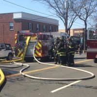 <p>Fairfield firefighters respond to the blaze Thursday downtown. </p>