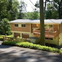 <p>This house at 239 Mill River Road in Chappaqua is open for viewing on Saturday.</p>