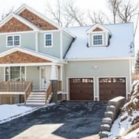 <p>This house at 7 Still Court in Ossining is open for viewing on Saturday.</p>