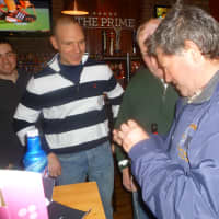 <p>Hastings DPW staffers present co-worker Rocky Tollefsen, right, with a watch.</p>