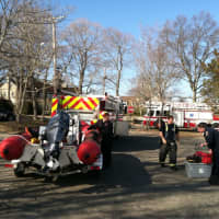 <p>Fairfield Firefighter Jon Catandella, Lt. Pat Barry, and Firefighter Tom Janik take up from marine rescue with Engine 1 and Marine 7.</p>