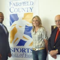 <p>Stamford native Garry Cobb, left, was inducted into the Fairfield County Sports Hall of Fame in 2010. He is with fellow inductees Amanda Pape and Vito Montelli.</p>