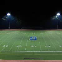 <p>Weston residents are seeking to bring lights to the football stadium at the high school, similar to these lights at Staples High School in Westport. </p>