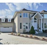 <p>This house at 11 Apple Court in Eastchester is open for viewing on Sunday.</p>