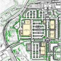 <p>The latest retail configuration shows 70,000 square feet of stores lining the entrance drive, with the 40,000-square-foot grocery store to the left and another 10,000 in the southern portion of the property. </p>