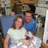 <p>Norwalk&#x27;s Matt and Christie Morris and their children will lead the 2014 March for Babies on May 3 in Stamford. Pictured are Matt and Christie Morris with son Jack in the NICU in 2006.</p>