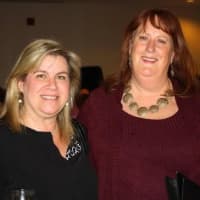 <p>Pam Blecker, left,  works with Keller Williams Community YMCA Executive Director Maire Brosnan.</p>