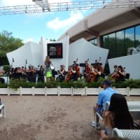 <p>The Harrison High School Orchestra performed at Melody Gardens in Walt Disney World</p>