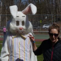 <p>Hastings Recreation Superintendent Kendra Garrison gives last minute instructions to the Bunny (Sam Brecker).</p>