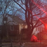 <p>Hazmat and fire crews set up near a house on Clinton Street near Oyster Road in Fairfield on Monday evening. </p>