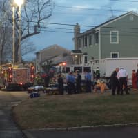 <p>Hazmat and fire crews set up near a house on Clinton Street near Oyster Road in Fairfield on Monday evening.</p>