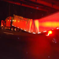 <p>The tractor-trailer buckled under the weight of its load after a crash on I-95 northbound in Norwalk. </p>