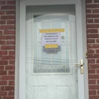 <p>A sign from Fairfield police warns residents to stay out of the home at 32 Clinton St.</p>