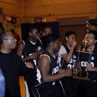 <p>The CUCD players celebrate a victory at the Hoop Challenge.</p>