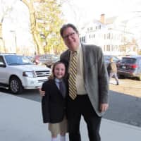 <p>Hadley Faulstich joined Principal Jim Dhyne greeting students at the car line. </p>