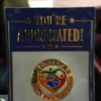 <p>The pin given to New Rochelle volunteers on Wednesday.</p>
