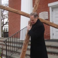 <p>The Rev. Dale Rosenberger begins the walk at the First Congregational Church of Darien.</p>