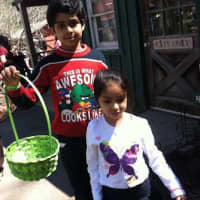 <p>A brother and sister attend the 10th Annual Heckscher Farm Easter Egg Hunt on Saturday in Stamford.</p>